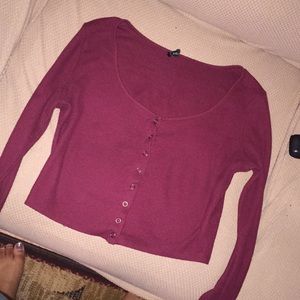 A Burgundy long sleeve crop top
